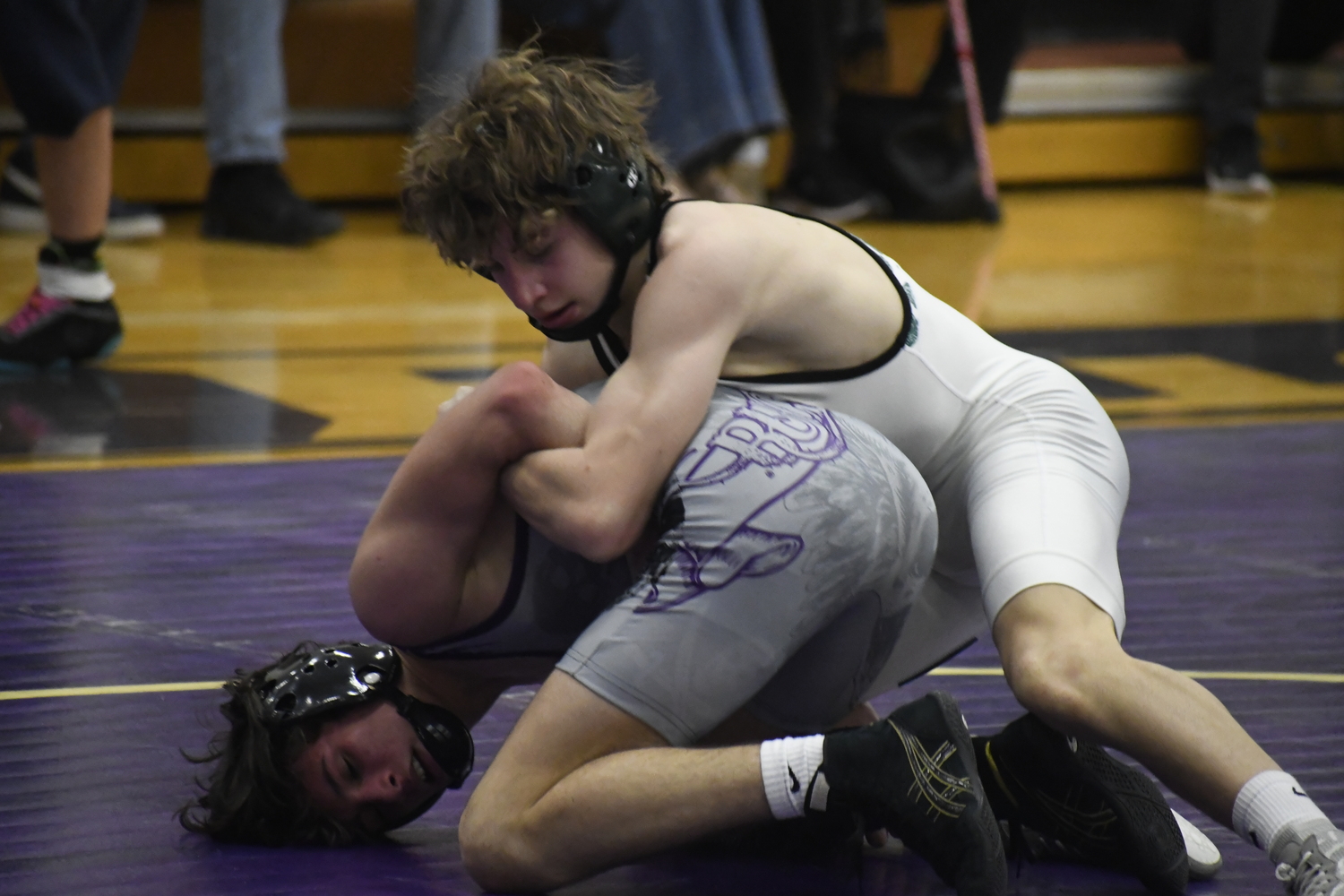 Dylan Blenk has an arm bar in on Islip's Nico Fallacaro in their league finals match on Saturday.  DREW BUDD