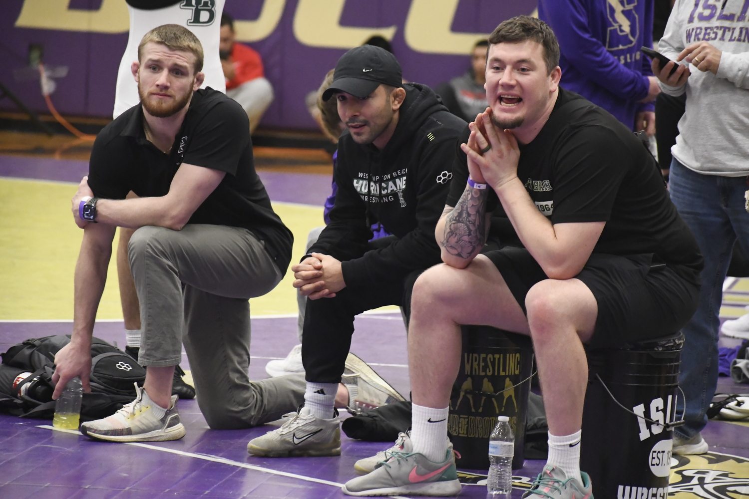 Hurricane coaches watch on from their corner in the league finals.  DREW BUDD