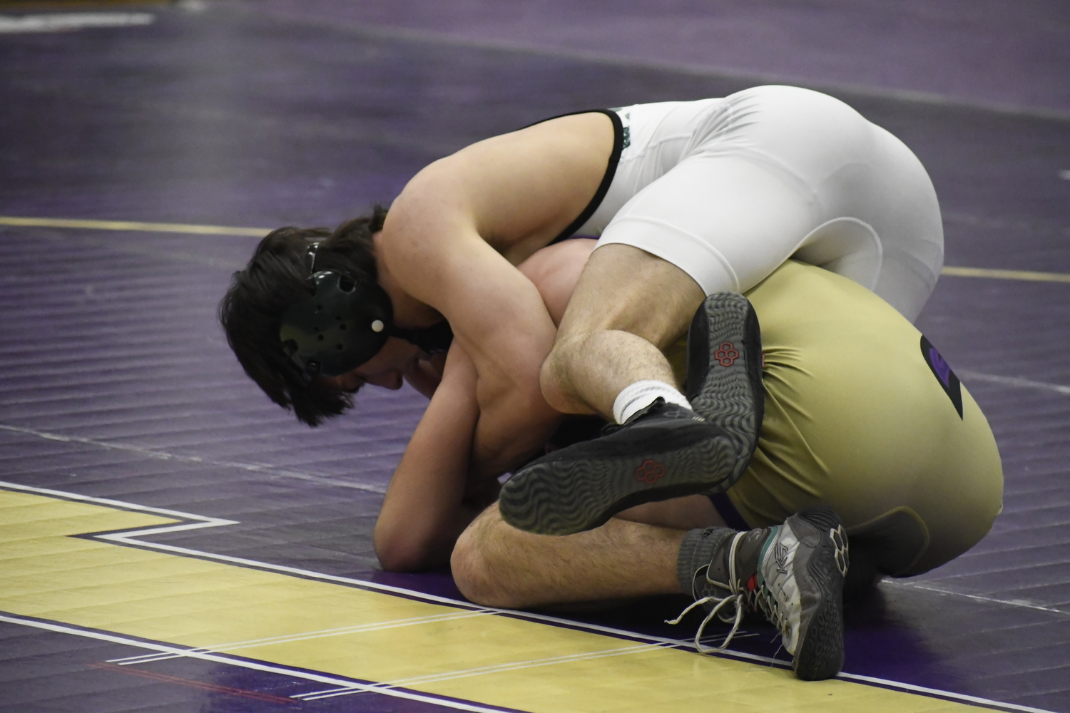 Westhampton Beach junior Carmine Esposito looks for an opening on his league final opponent.  DREW BUDD