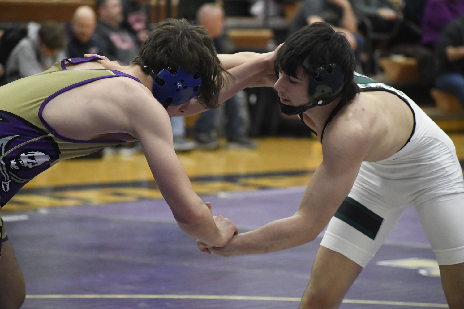 Westhampton Beach junior Carmine Esposito looks for an opening on his league final opponent.  DREW BUDD