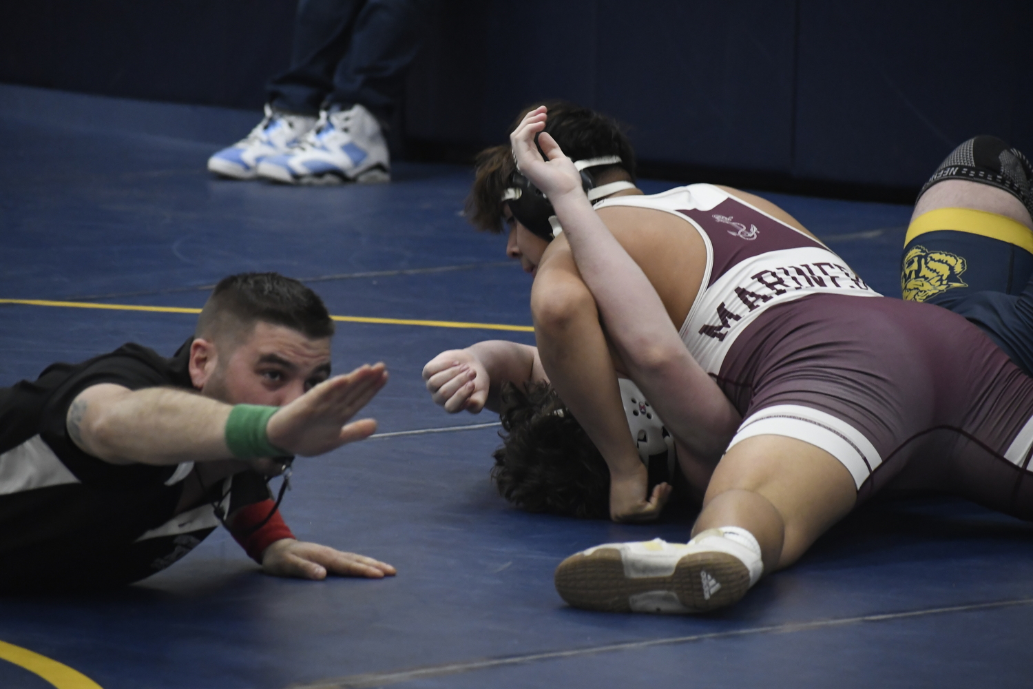 Cruz Espinoza lands a pin.   DREW BUDD