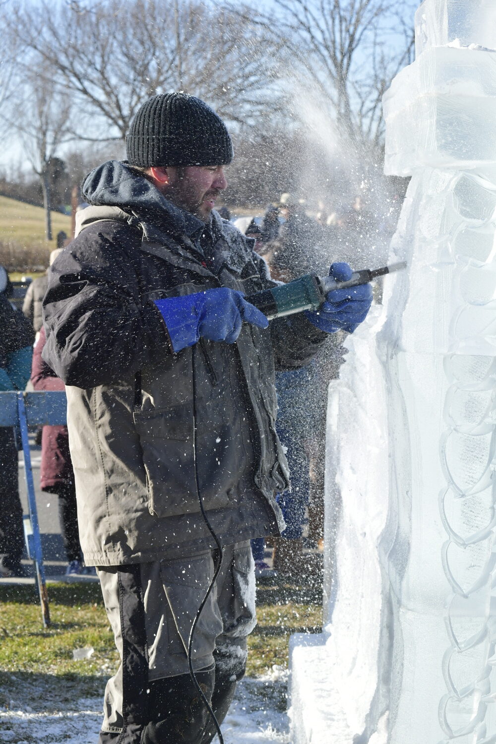 Ice carver Rich Daly creates a tableau at HarborFrost 2024.  DANA SHAW