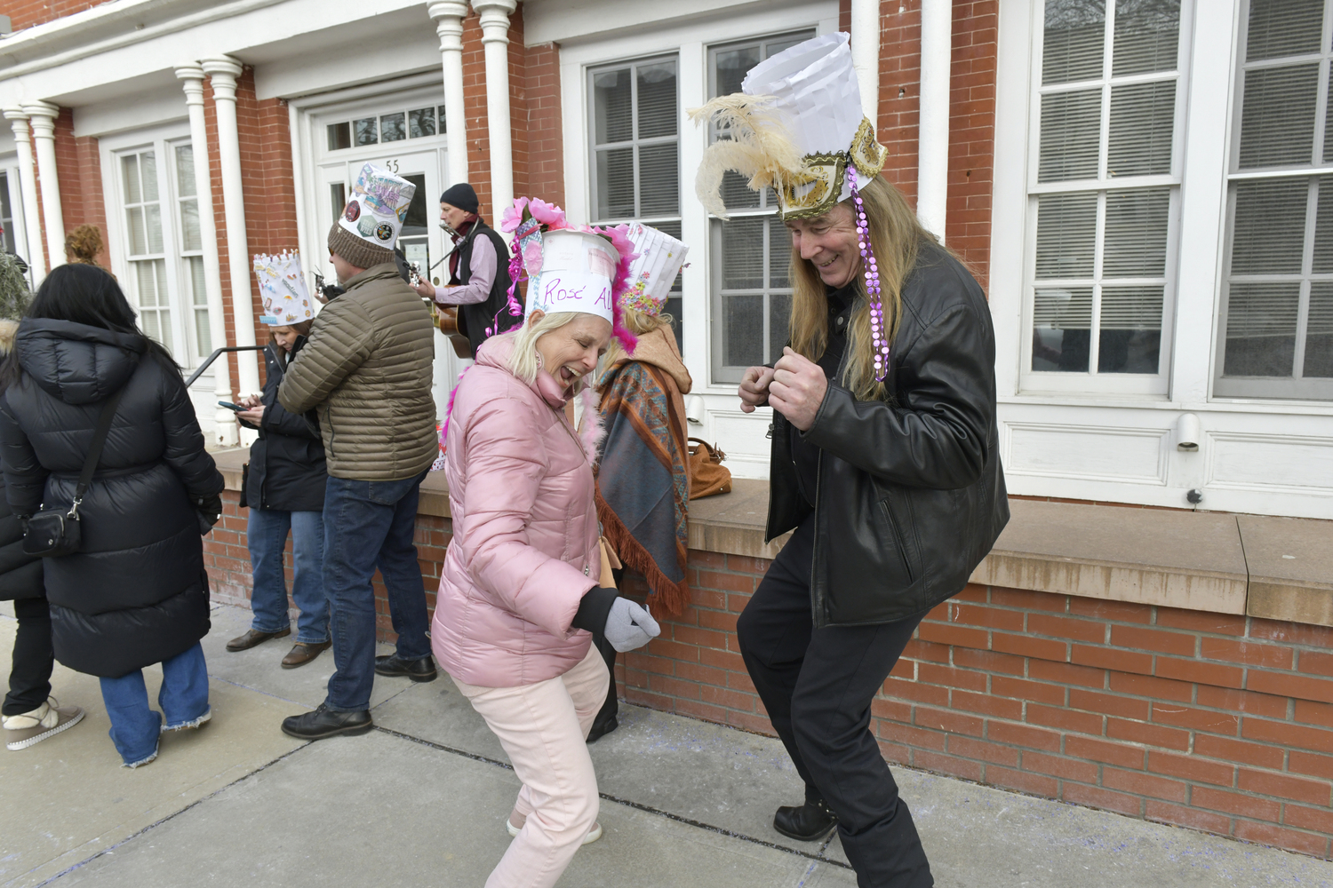 Cindy Lenkiewicz and Leo Claus take a dance break during the Sag Harbor Hysterical Society's Culinary Stroll on Saturday afternoon.  DANA SHAW