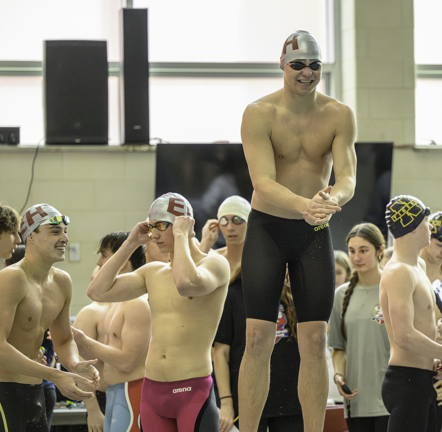 Pierson junior Dylan Knapik waiting for his turn in the 200-yard freestyle relay.   MARIANNE BARNETT