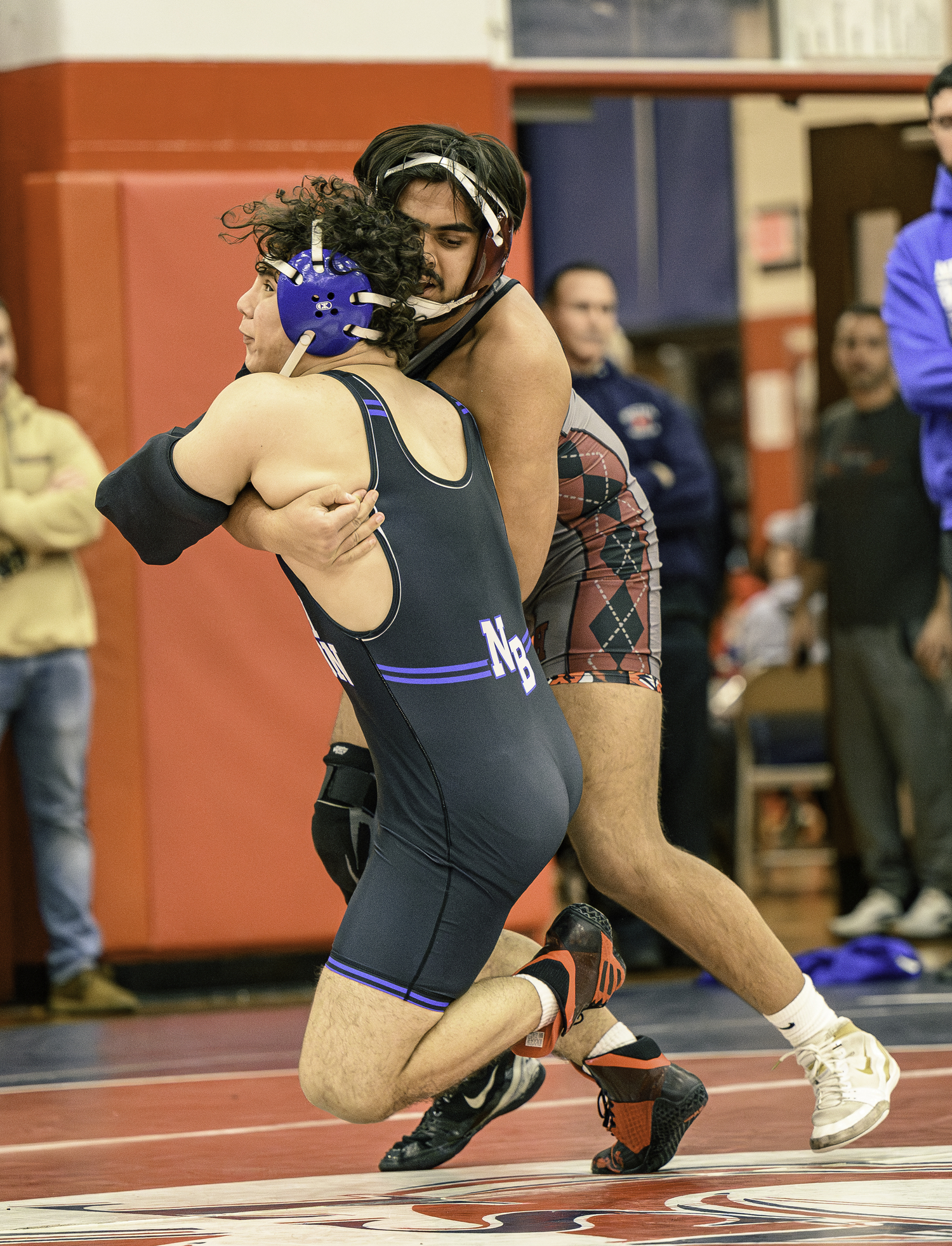 East Hampton senior Aman Chugh defends against North Babylon's Jacob Ruiz.   MARIANNE BARNETT