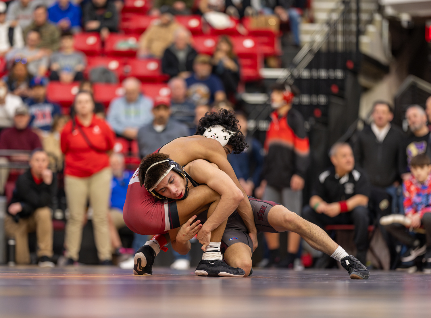 Juan Roque tries to take down Julian Medina.  RON ESPOSITO