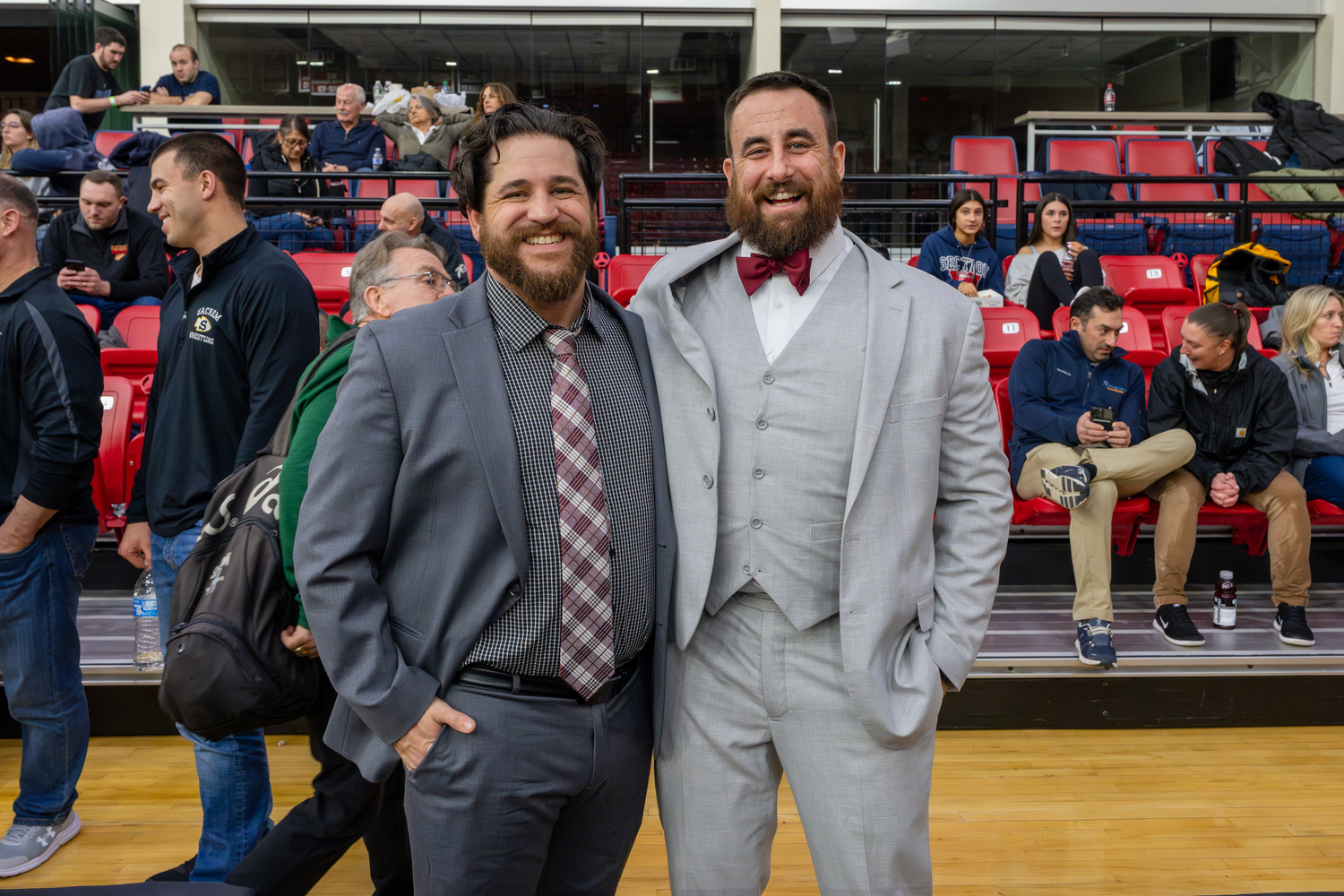 East Hampton coaches Cory Strain, left, and Ethan Mitchell all dressed up the county final and semifinals on Saturday afternoon.   RON ESPOSITO