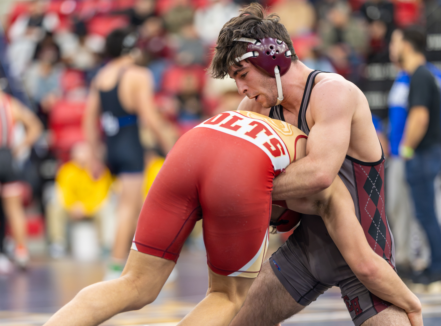 East Hampton senior Justin Prince defends against Half Hollow Hills West junior Kade Diaz.   RON ESPOSITO