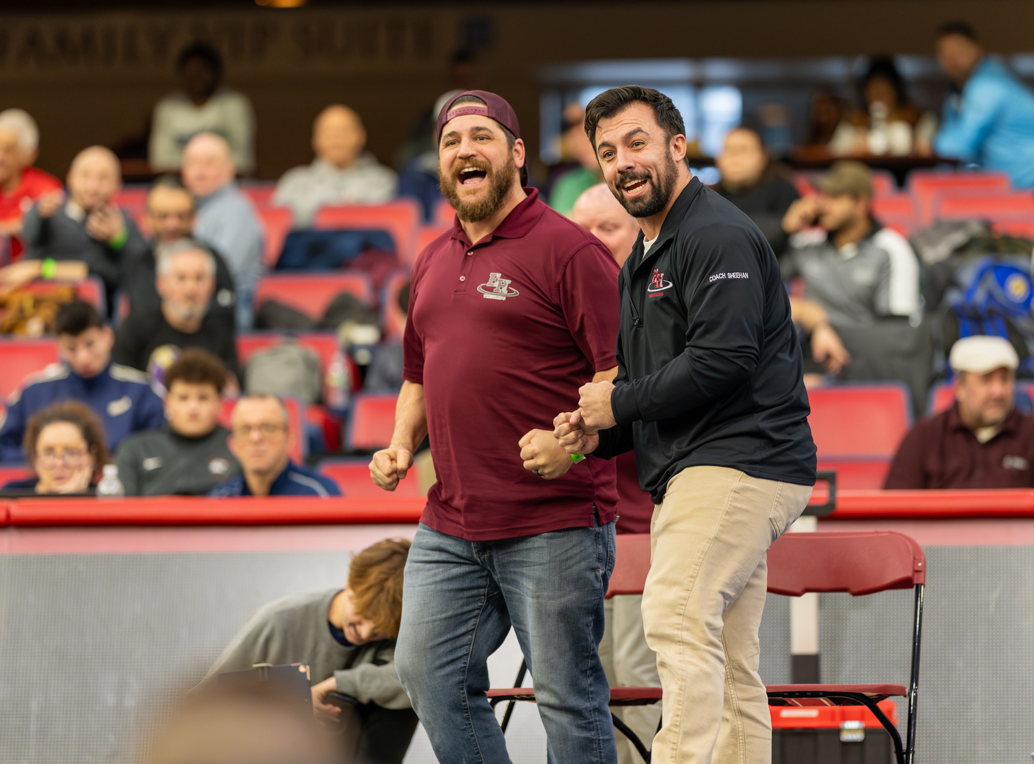 Bonac assistant coaches Cory Strain, left, and Kyle Sheehan react.   RON ESPOSITO