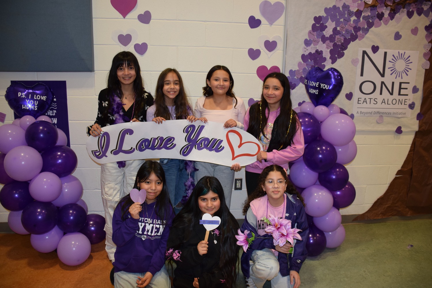 Continuing its mission to foster a culture of kindness, Hampton Bays Middle School held a weeklong initiative that ended in P.S. I Love You Day on February 14. The day aims to
raise awareness about bullying and suicide while promoting kindness. Students embraced the theme by showing kindness to their peers throughout the week through a variety of activities. They wrote positive messages on Post-it notes that are displayed throughout the school and took part in a No One Eats Alone Day. They also participated in an assembly with HUGS Inc., during which they engaged in discussions surrounding the importance of health, wellness and empowerment. Additionally, they raised funds for OLA Eastern Long Island through a P.S. I Love You Day sticker sale. COURTESY HAMPTON BAYS SCHOOL DISTRICT