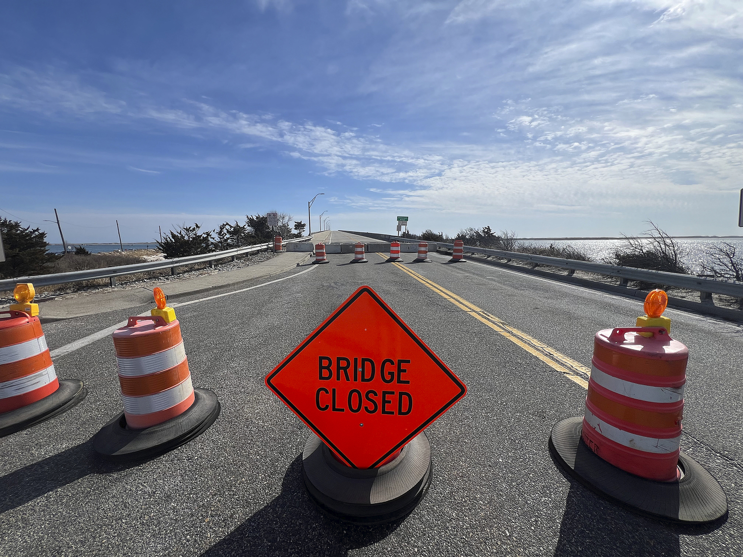 The Ponquogue Bridge in Hampton Bays remains closed to vehicle and foot traffic on tuesday after it was closed on Friday by New York State engineers who detected signs of weathering in the concrete of at least one of the bridge's supports. DANA SHAW