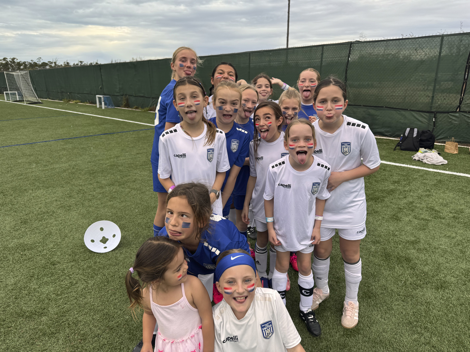 The 2015 Southampton Town United girls travel soccer team went to the Bahamas last month to play competitive
games against some local teams, train in beach soccer and give back to the youth in the area by donating equipment.