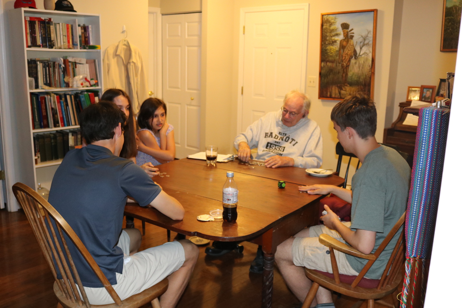 John Strong and his grandchildren play a game of poker. COURTESY LARA STRONG