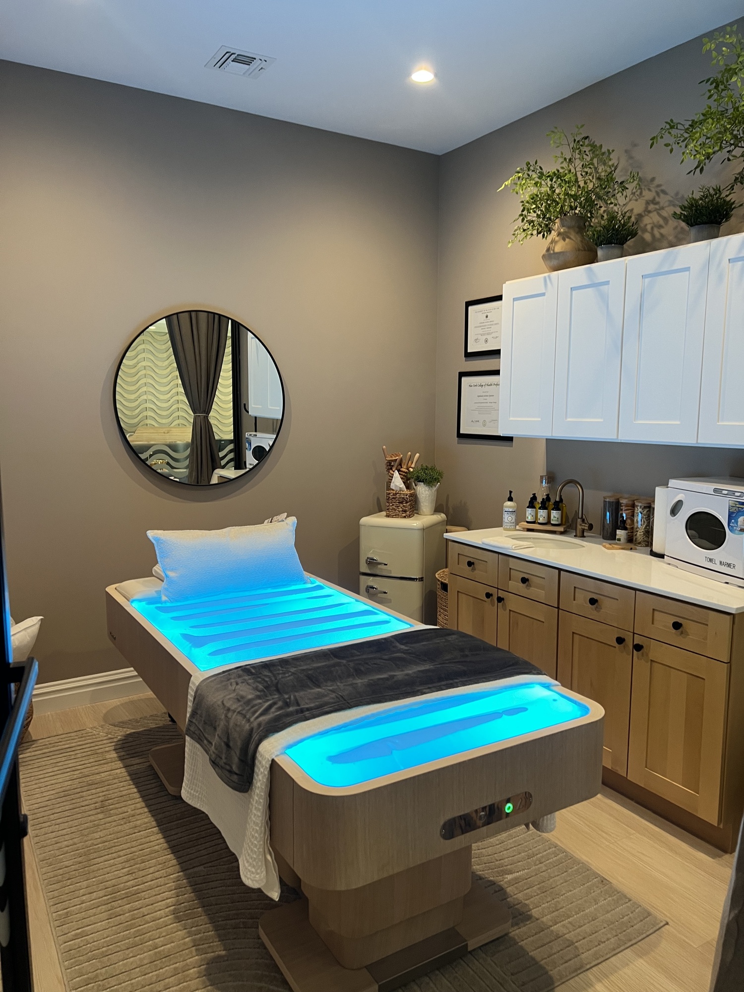 The LemiFloat Bed, a heated chromotherapy water massage bed for several WAVE treatments, including CalmWAVE, Lymphatic DetoxDrift and PrenatalEase, crafted to help heal bodies and release tensions through the combined elements of the bed and therapist expertise, created by co-founder and massage therapist Stephanie Esposito. COURTESY WAVE WELLNESS