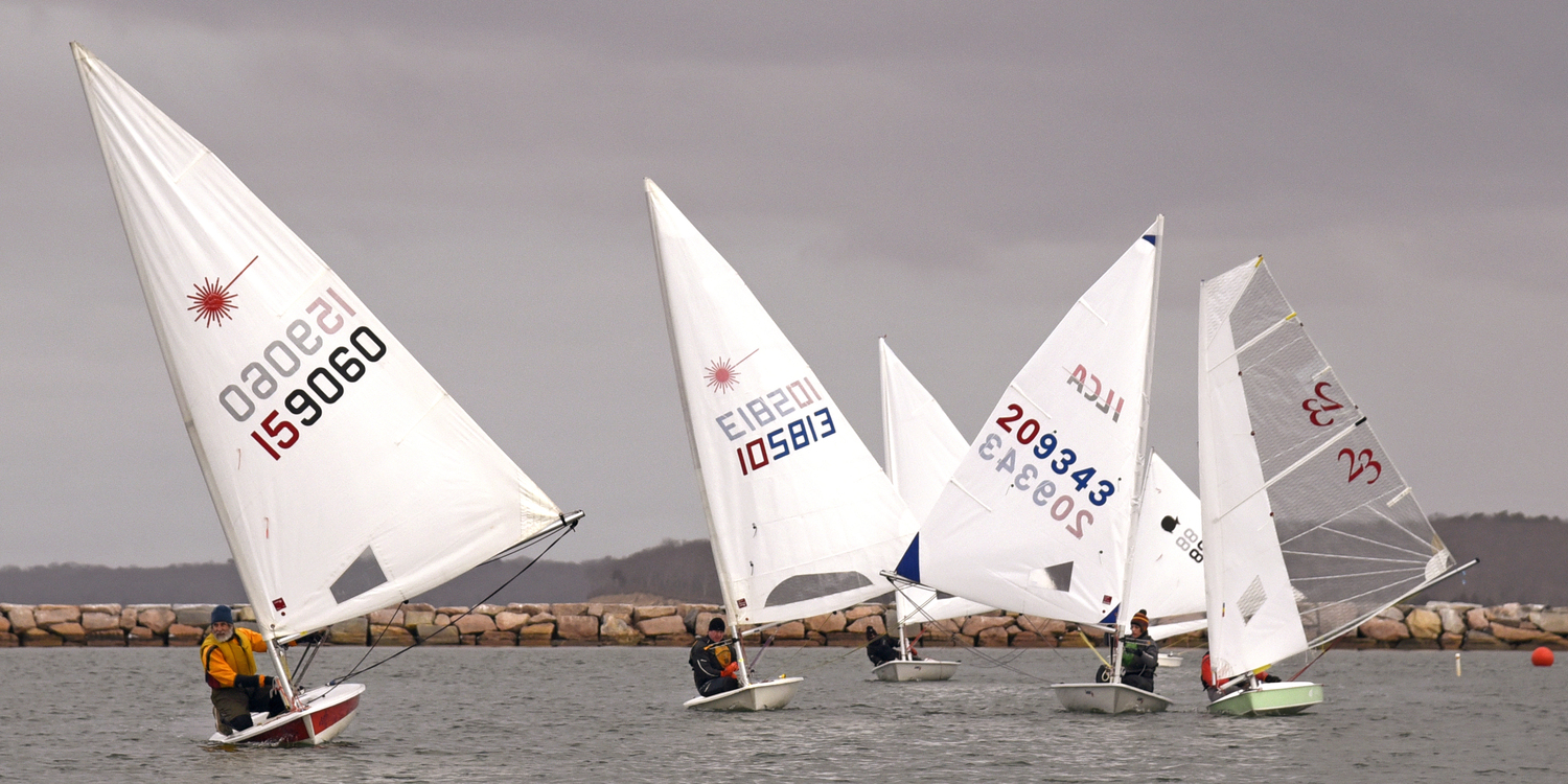 After rounding the weather mark, the front four, from left, Derrick Galen, Rudy Ratsep, Rachel Beardsley and Gloria Maroti Frazee, with laser-beam focus on the leeward mark in the fifth race.  MICHAEL MELLA