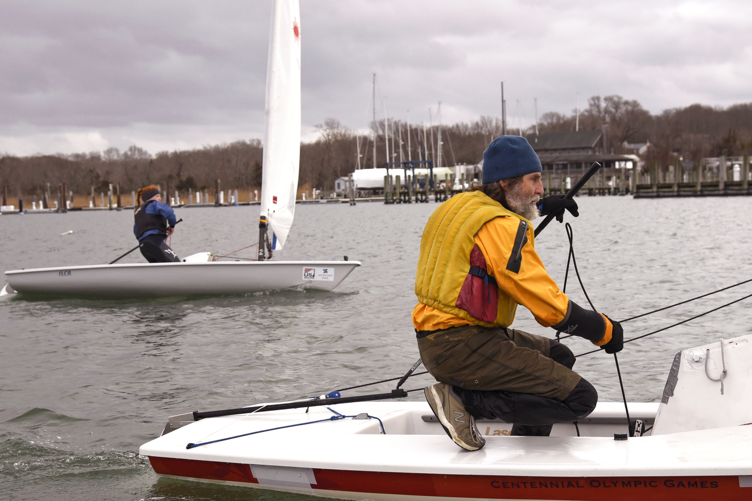 Fourth place Venetia Satow trying in vain to pass second place Derrick Galen off the port side of the committee boat.   MICHAEL MELLA