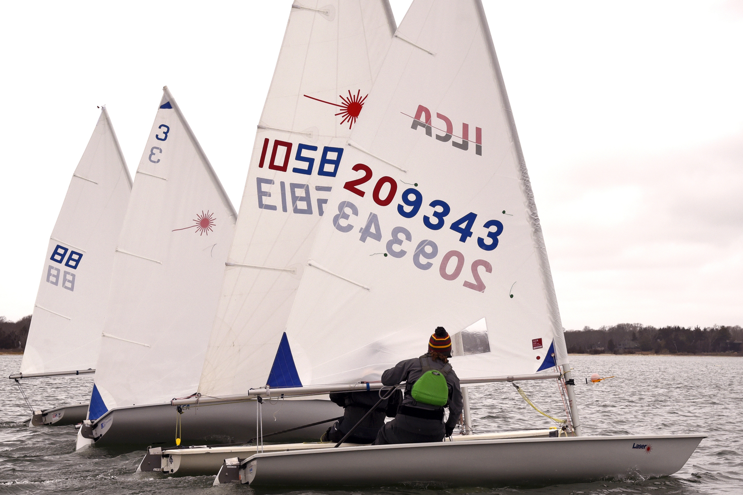 From left, Joan Butler, Venetia Satow, Rudy Ratsep and Rachel Beardsley, foreground, approach the pin end of the start line within a second of each other.   MICHAEL MELLA