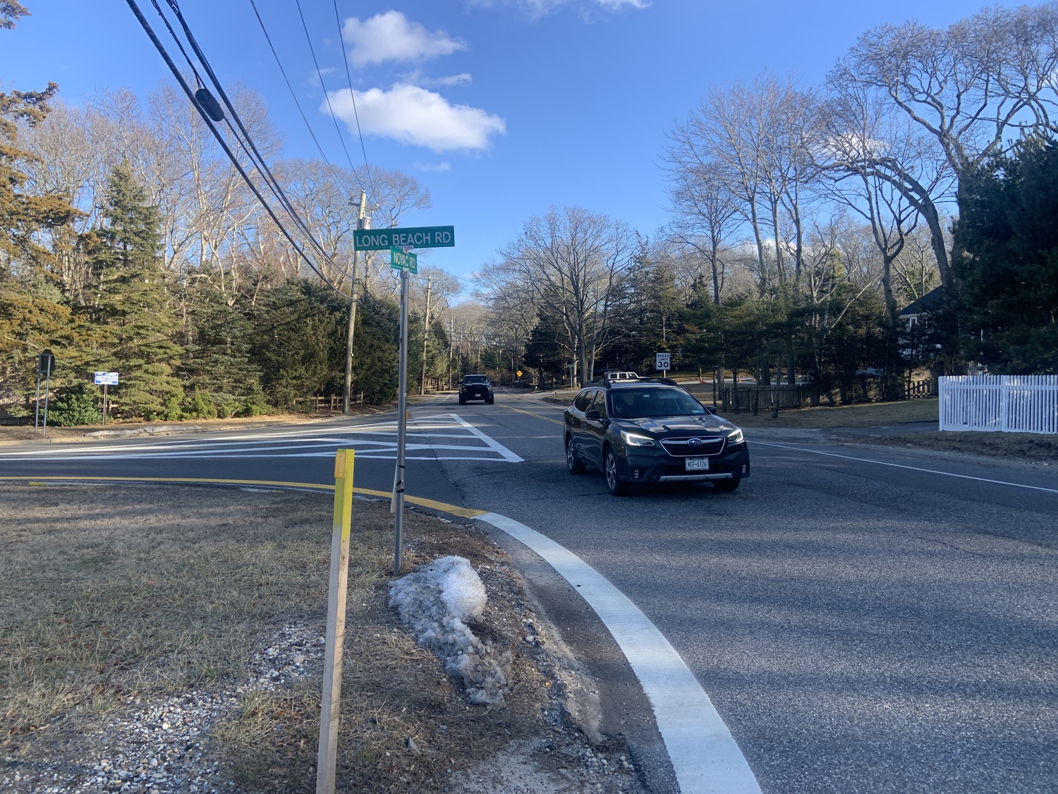 Westbound traffic on Noyac Road, like the vehicleS pictured above, would have a stop sign just before Long Beach Road in Noyac under a plan proposed by Southampton Town Highway Superintendent Charles McArdle. STEPHEN J. KOTZ