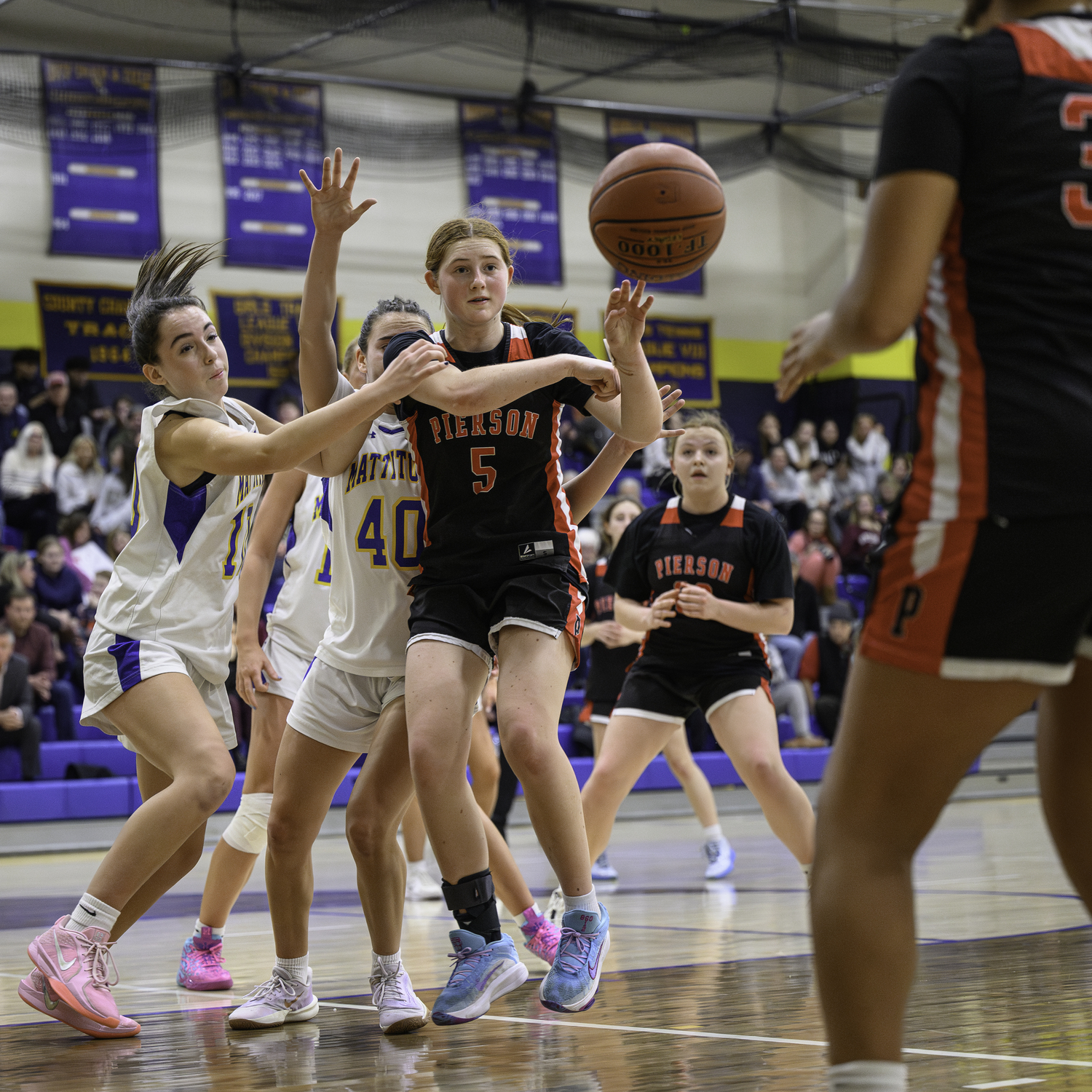 Josie Mott passes out of a double team.   MARIANNE BARNETT