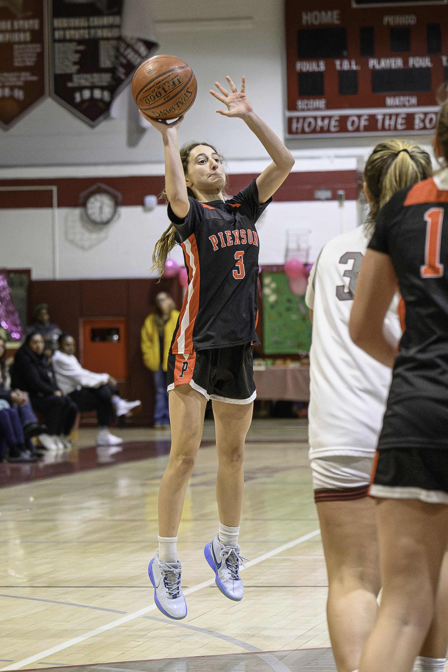 Pierson freshman Molly Wolfson shoots a three-pointer.  MARIANNE BARNETT