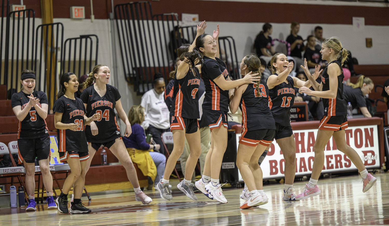 The Pierson JV team, which played prior to varsity, is ecstatic with a win.   MARIANNE BARNETT