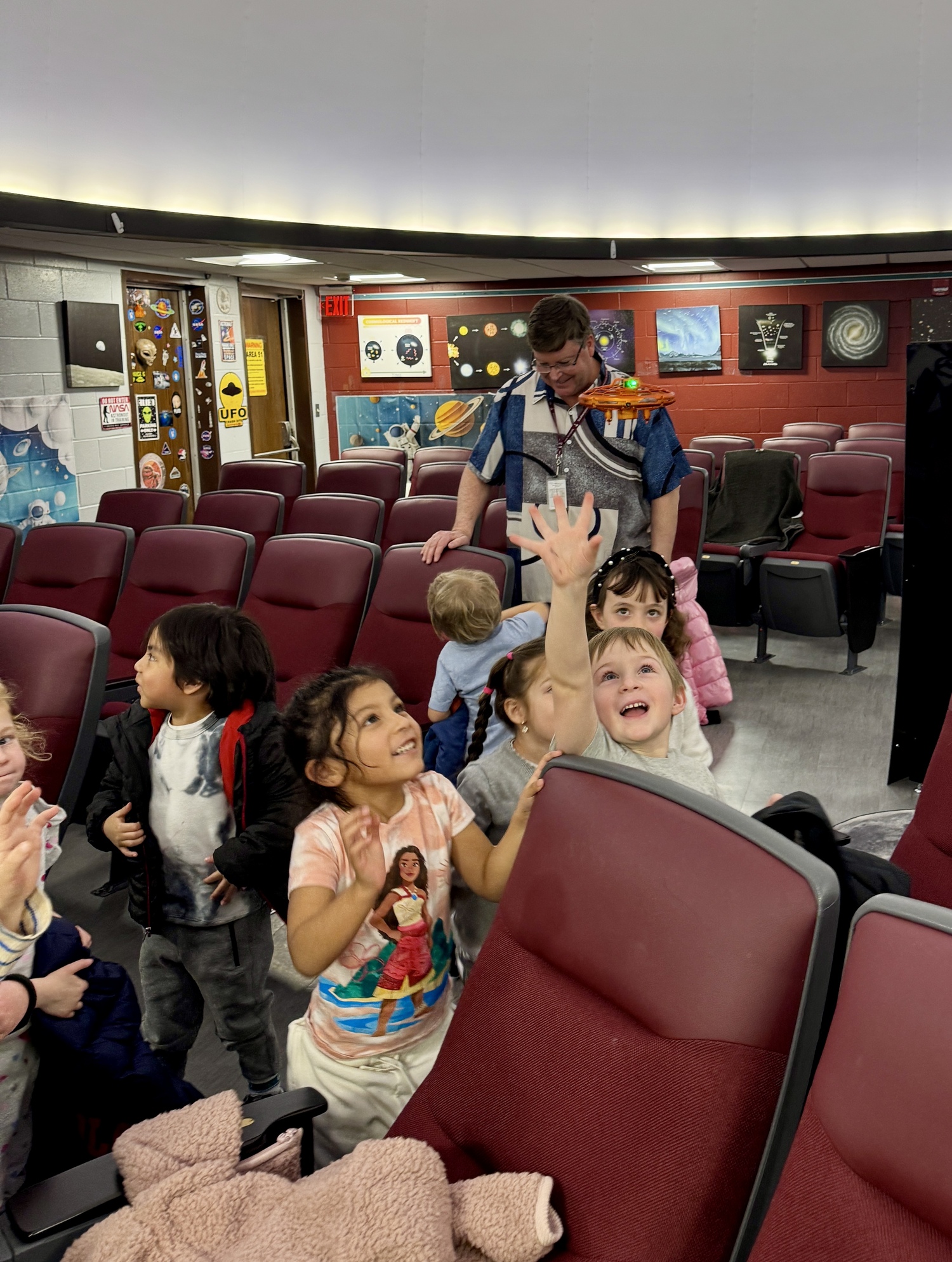 Pre-K students from the Sag Harbor Learning Center took a field trip to the planetarium at Southampton High School. John Walsh, the Southampton High School astronomy teacher, gave the students a 