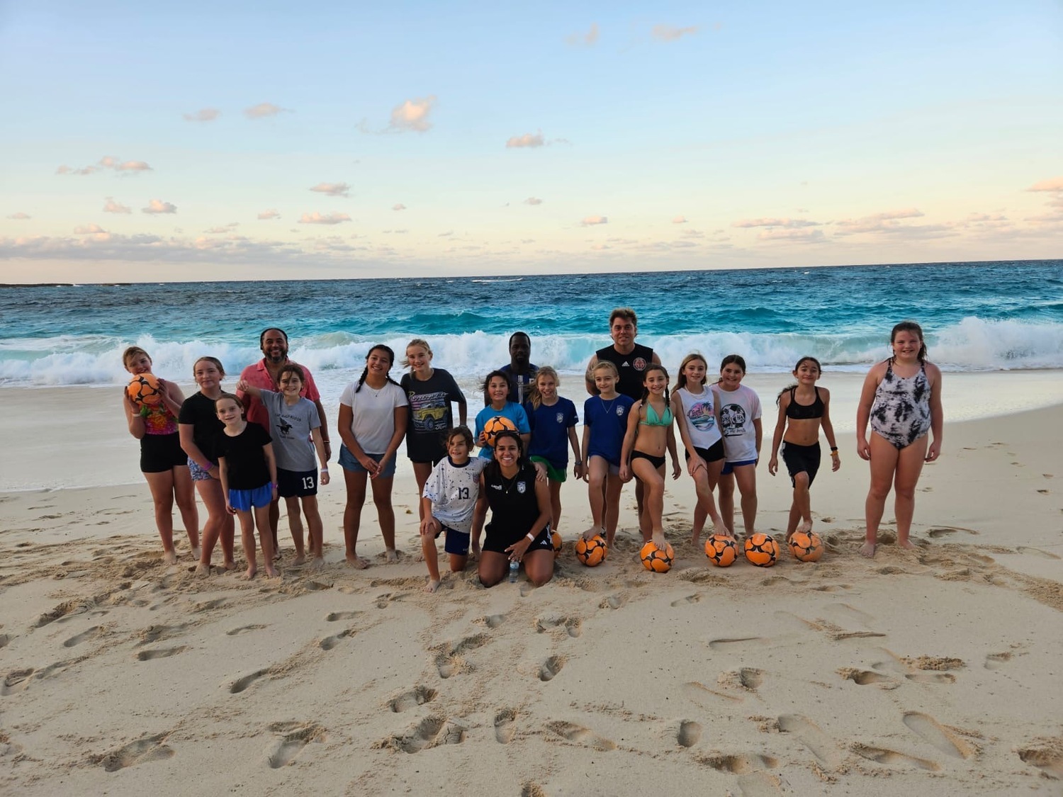 The 2015 Southampton Town United girls travel soccer team went to the Bahamas last month to play competitive
games against some local teams, train in beach soccer and give back to the youth in the area by donating equipment.