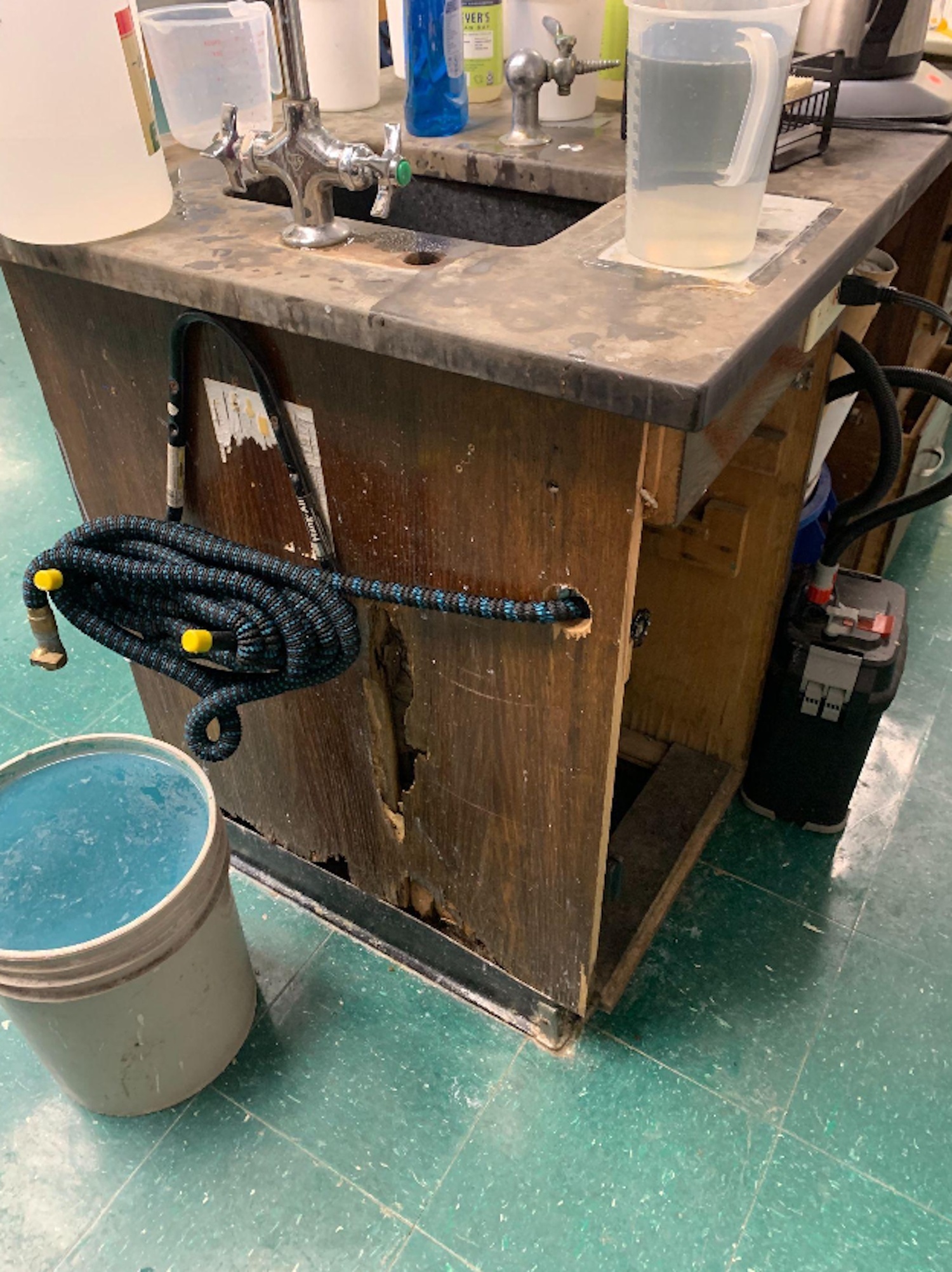 An existing science teacher demonstration desk is broken and badly worn. SPRINGS SCHOOL DISTRICT