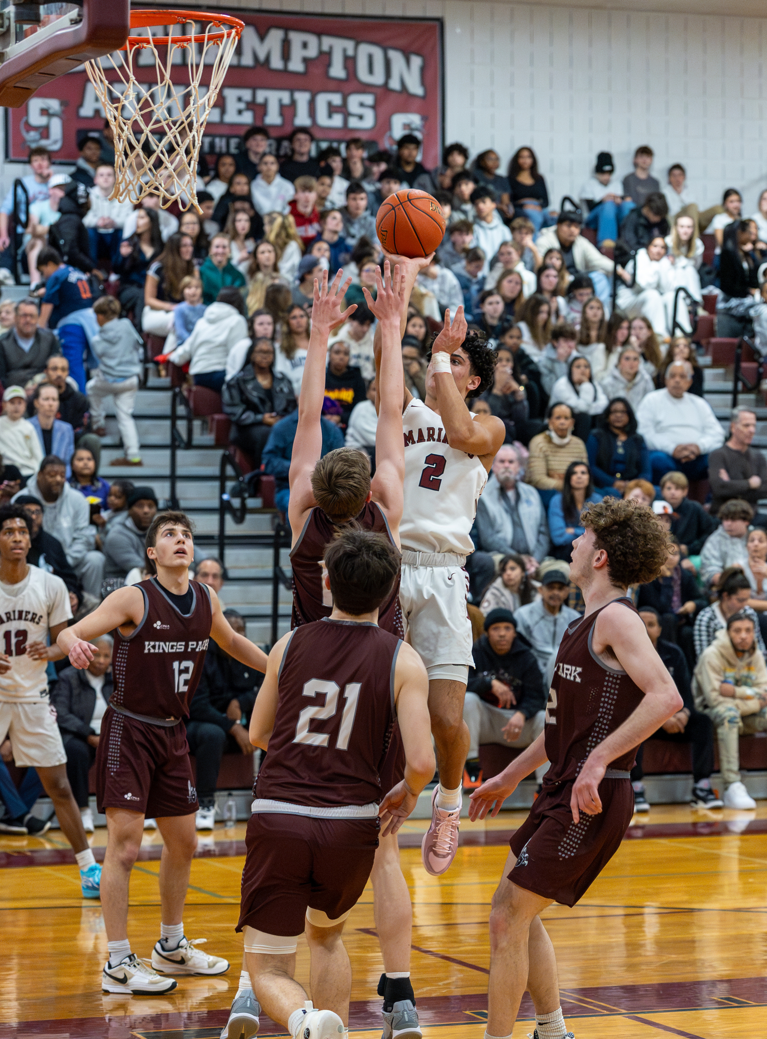 Alex Franklin puts up a shot over a number of Kings Park defenders.   RON ESPOSITO/SOUTHAMPTON SCHOOL DISTRICT