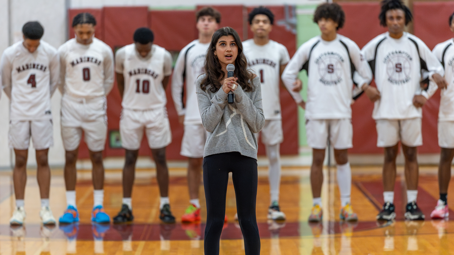 Cameryn Ava sings the national anthem prior to Tuesday night's game. RON ESPOSITO/SOUTHAMPTON SCHOOL DISTRICT