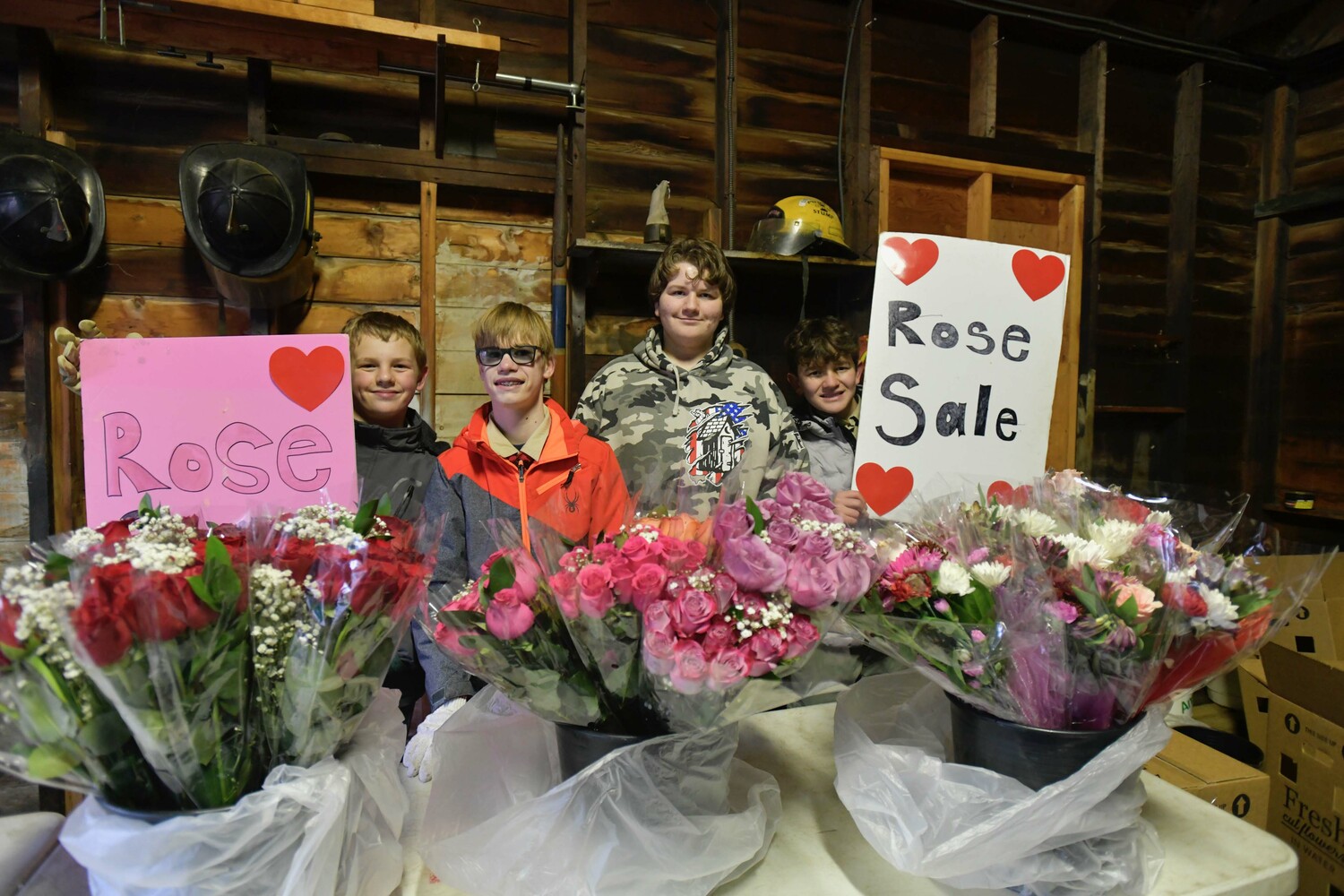 Scouts from Hampton Bays Troop 483 Johnathan Tuohy, Julien Micheels, John Anderson and Henry Franzen sell roses leading up to Valentine's Day on February 13.   DANA SHAW