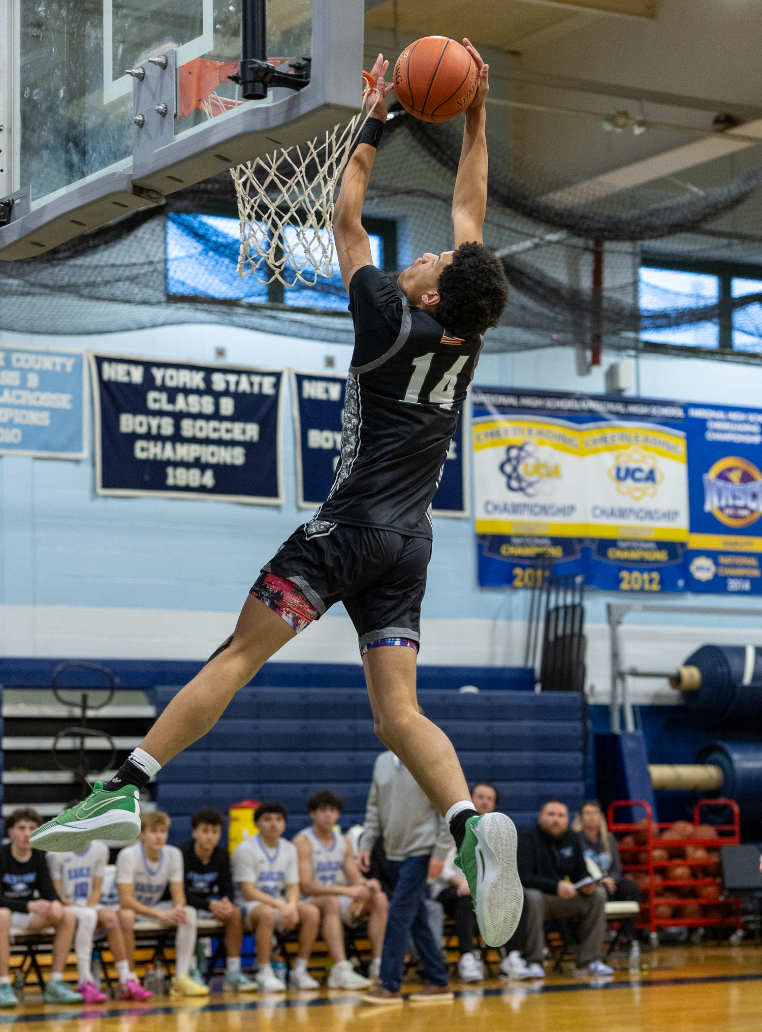 Senior center Jorden Bennett dunks the ball. RON ESPOSITO