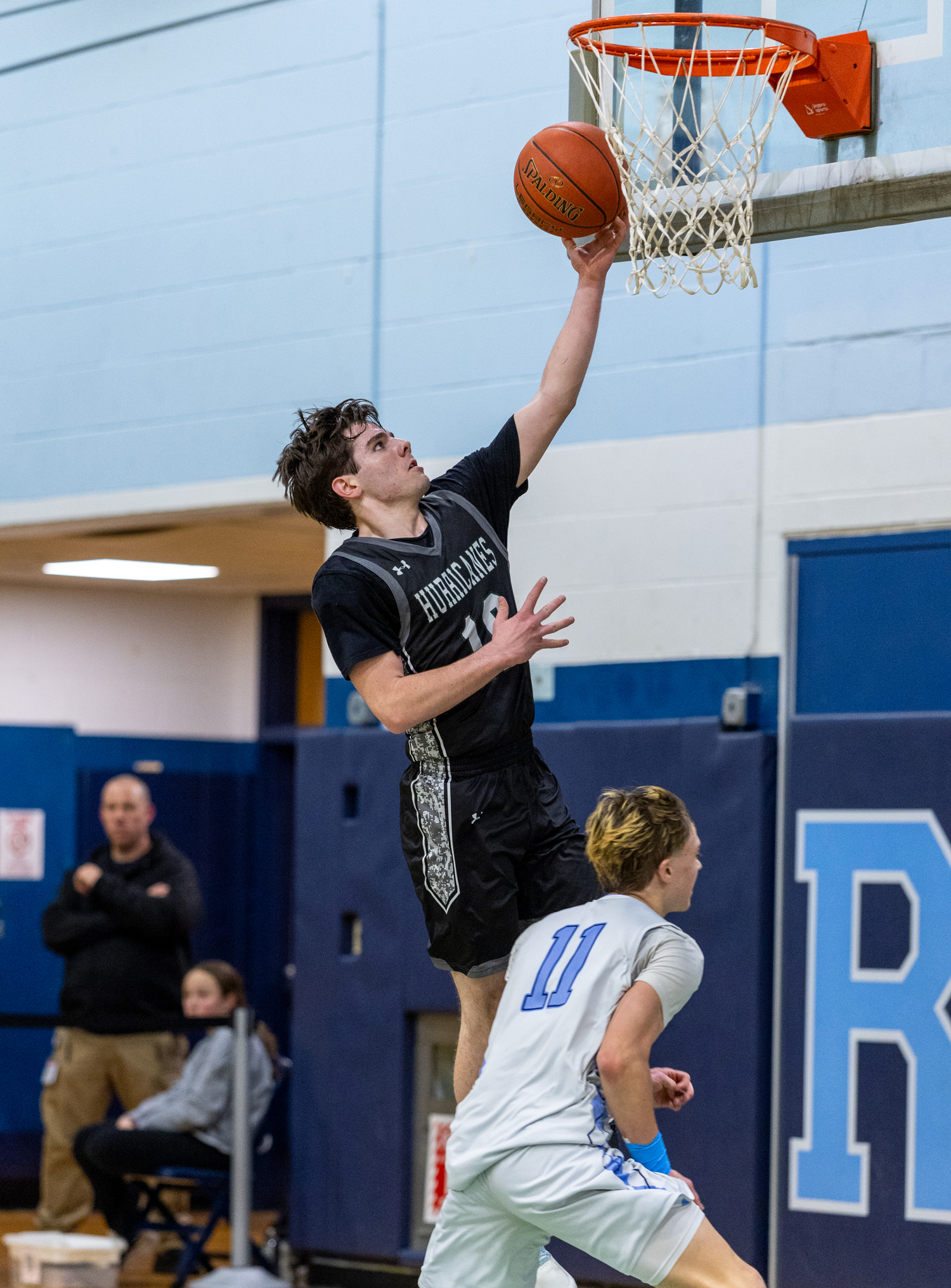 Junior guard Truman Hahn hits a layup. RON ESPOSITO