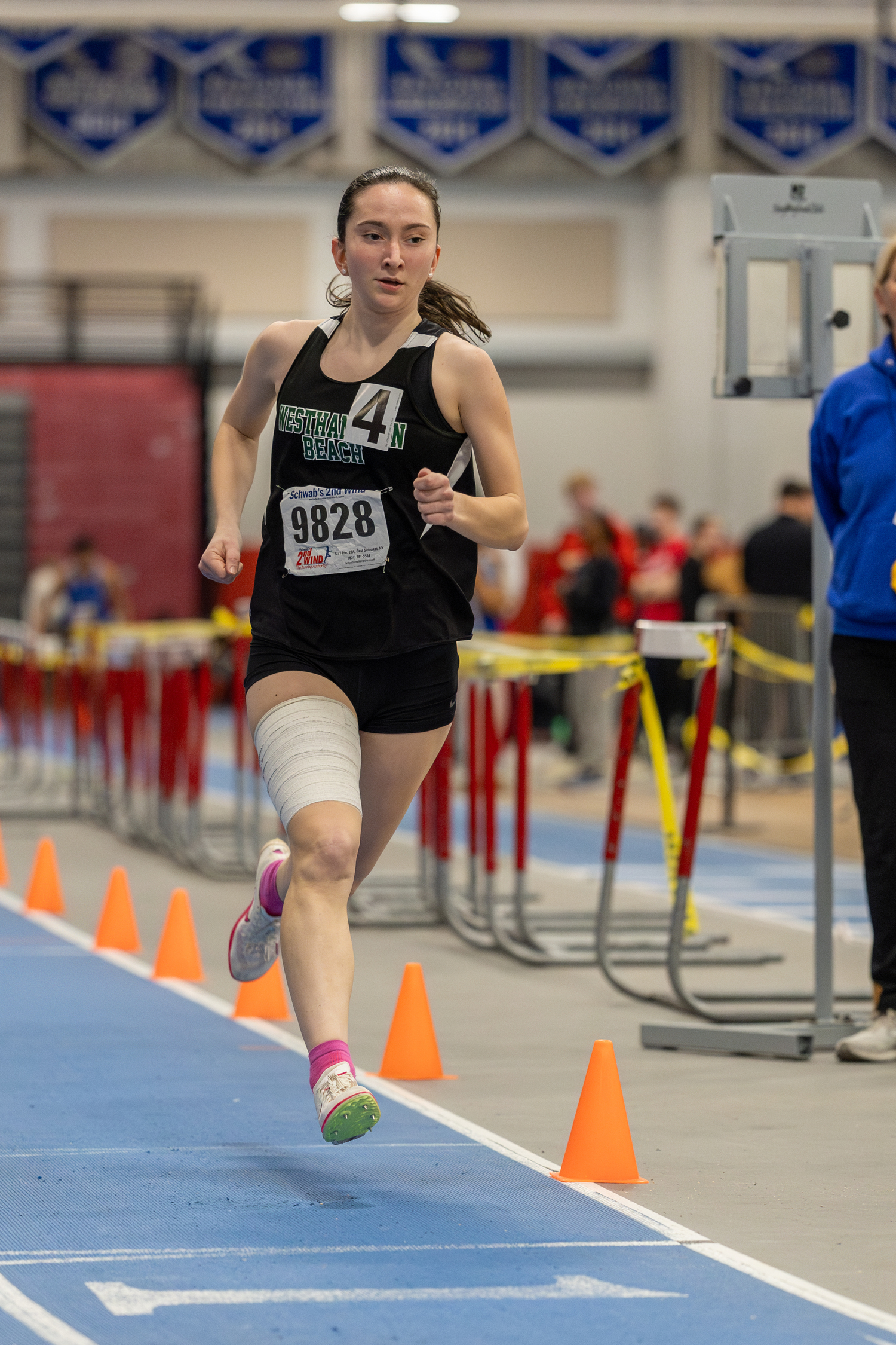 Westhampton Beach senior Lily Strebel gutted out a pair of performances in the 1,000- and 1,500-meter races.   RON ESPOSITO