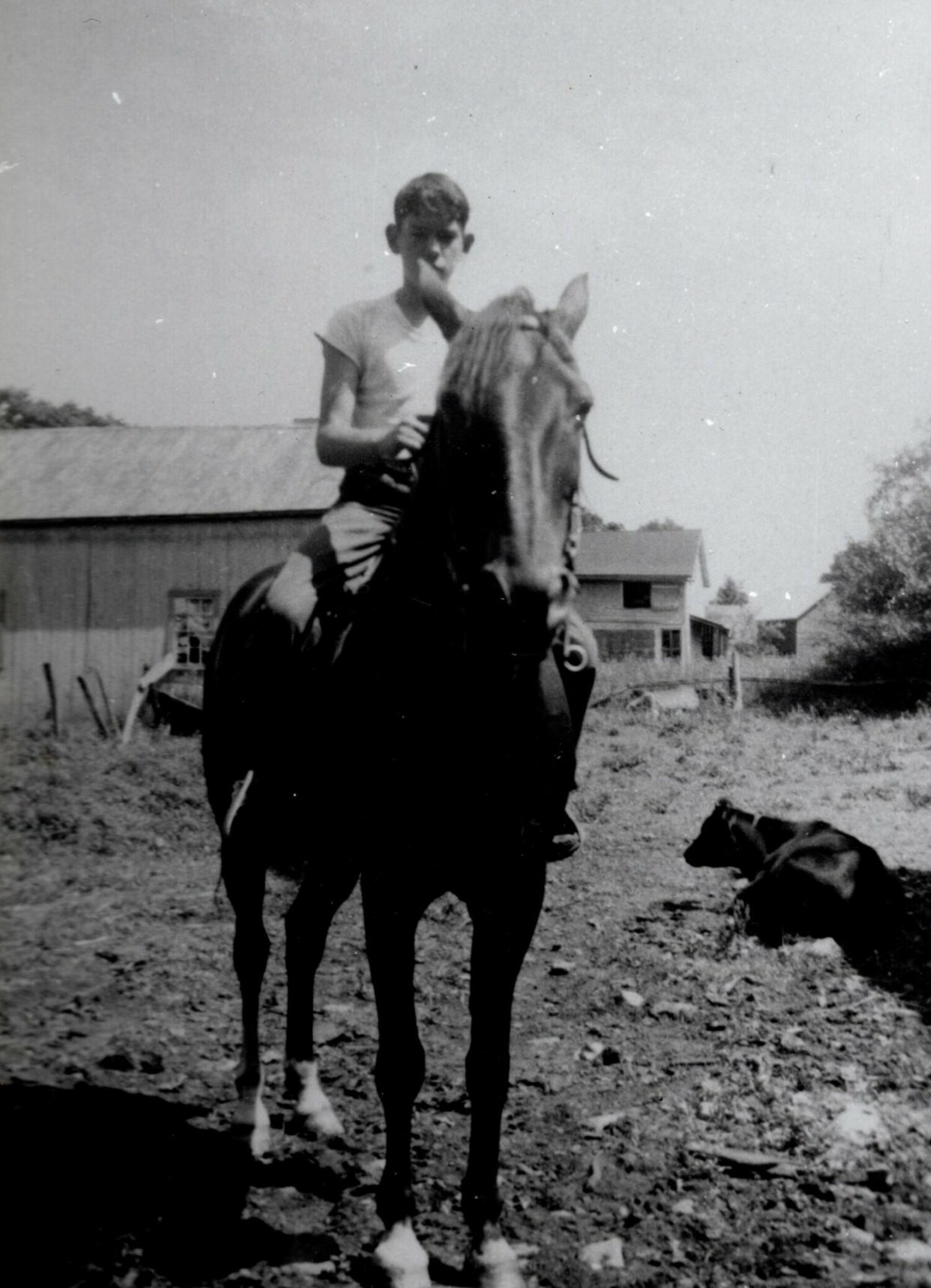 John Strong, growing up on the farm in Schuyler Lake, New York. COURTESY LARA STRONG