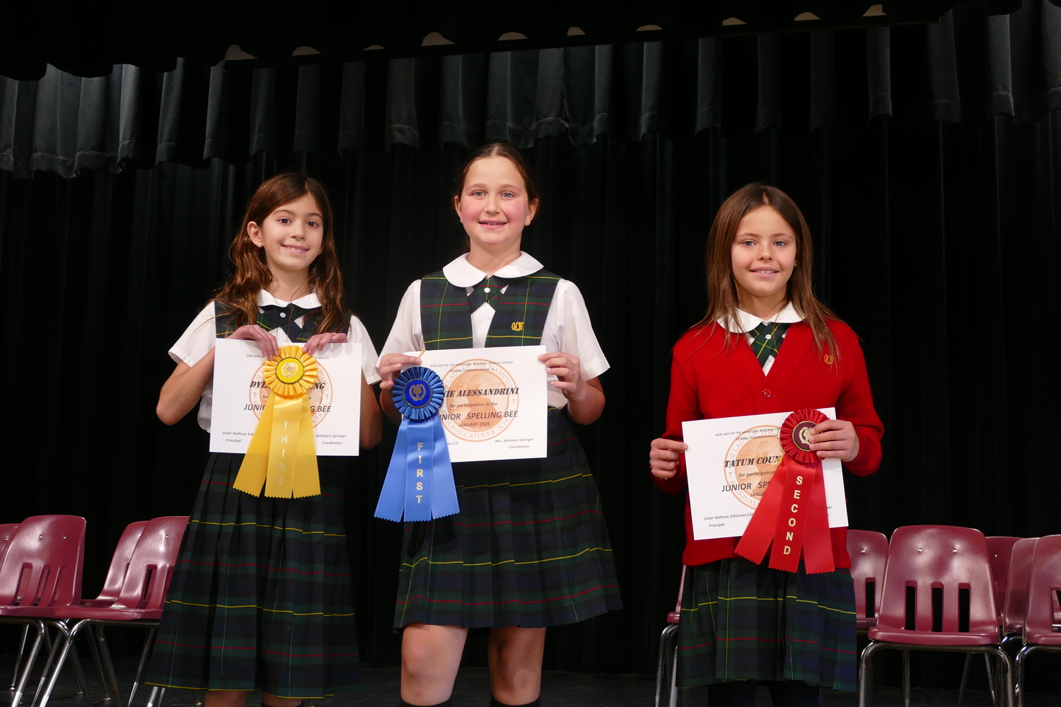 The Our Lady of the Hamptons School junior spelling bee winners, from left, Annie Alessandrini, Tatum Counihan, Dylan Cheewing. COURTESY OUR LADY OF THE HAMPTONS SCHOOL