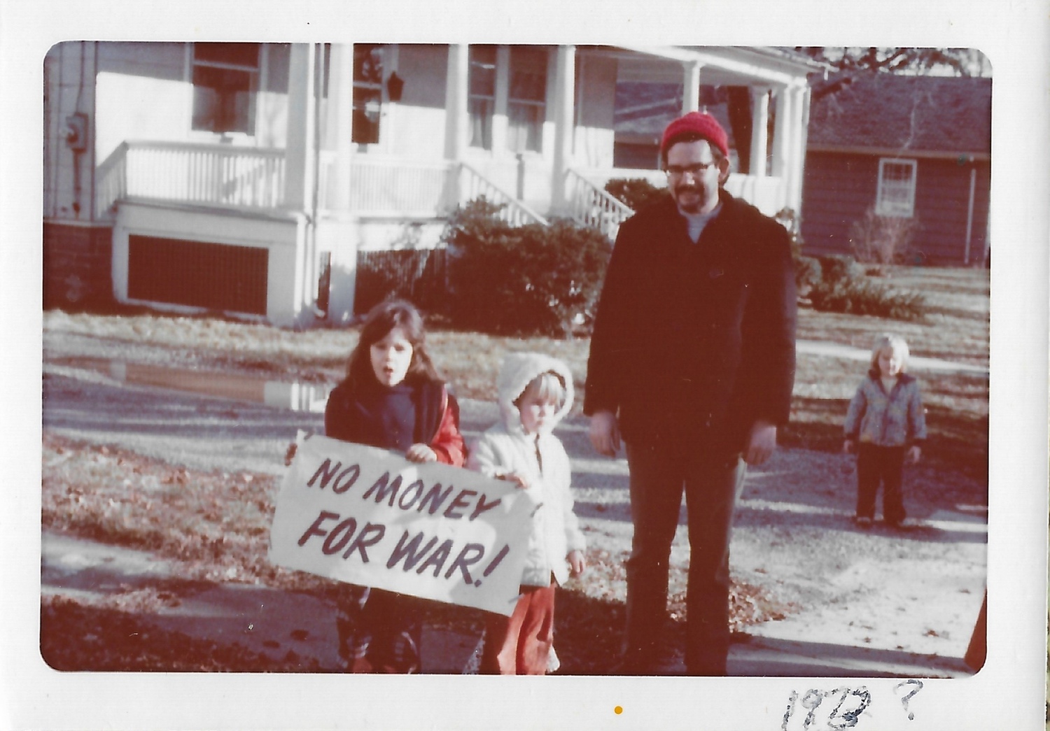 John Strong attends a protest against the Vietnam War with his daughters, Lisa and Lara, in tow, circa 1973. COURTESY LARA STRONG