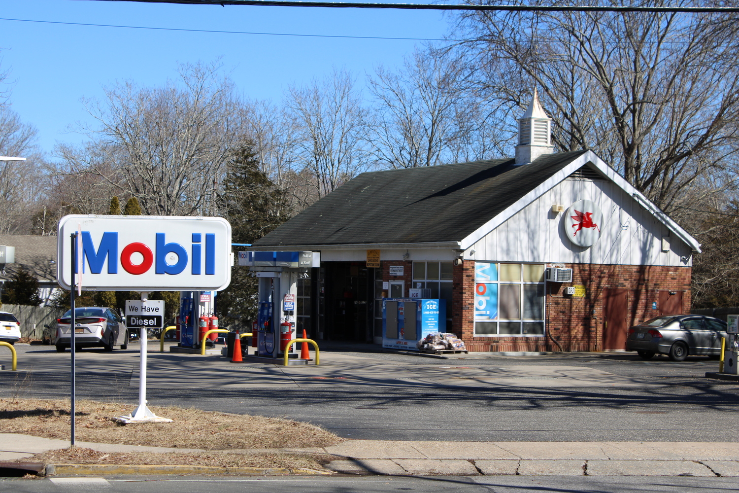 The East Hampton Town Planning Board unanimously agreed that a proposal to expand the Mobil Station in Amagansett into a Bolla Market would not fit the character of the community. JACK MOTZ