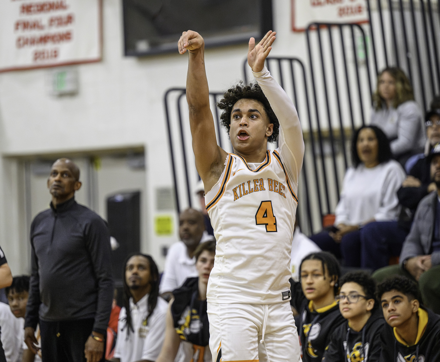 Alex Davis shoots a three-pointer.  MARIANNE BARNETT