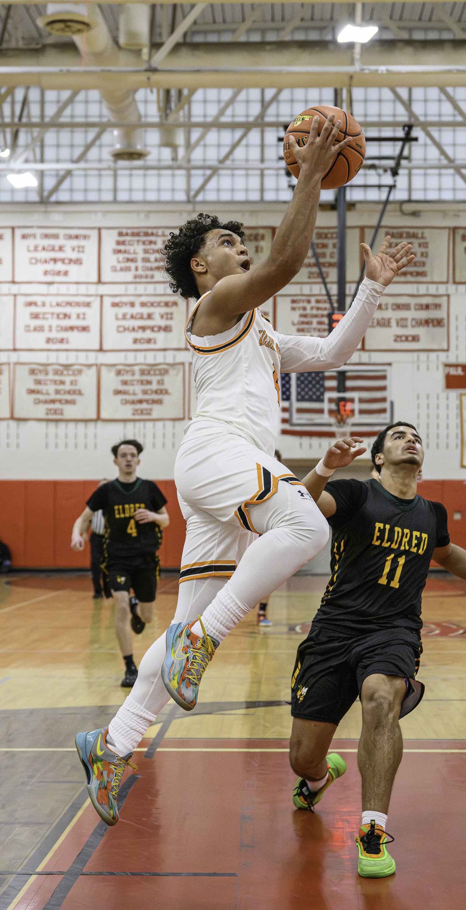 Alex Davis goes hard to the basket.  MARIANNE BARNETT