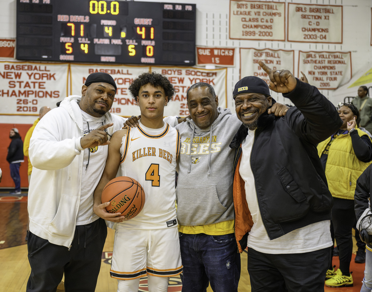 Oran Davis, left, with Alex and Randy Davis and Mike Feaster.  MARIANNE BARNETT