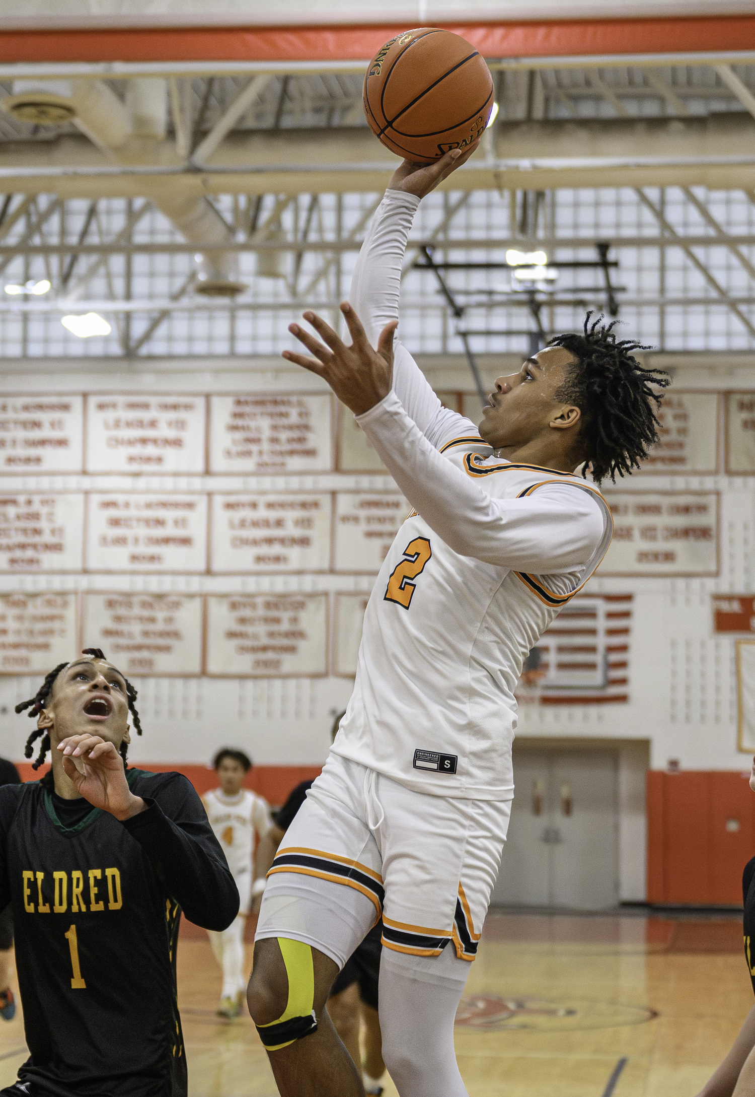 Jai Feaster goes for two of his game-high 25 points.   MARIANNE BARNETT