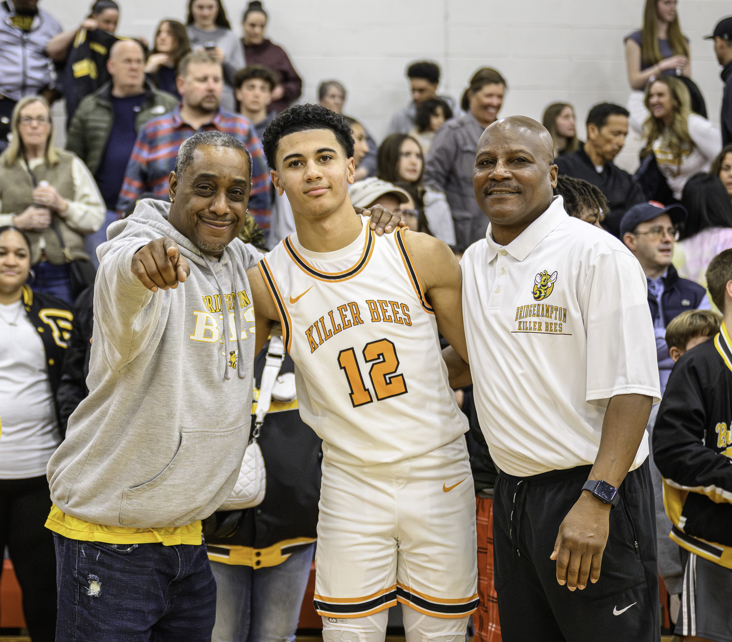 Randy Davis, left, with Xavier and Andre Johnson.  MARIANNE BARNETT