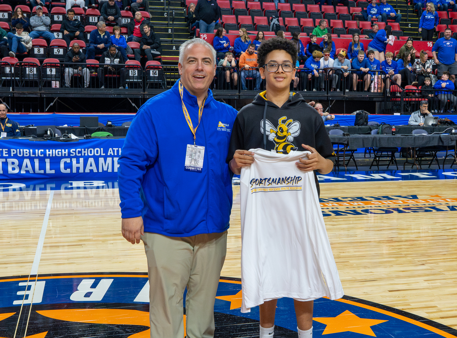 Section XI Boys Basketball Chairperson Todd Galluscio, left, with Bridgehampton senior Engher Suarez after he was given the team's sportsmanship award.   RON ESPOSITO