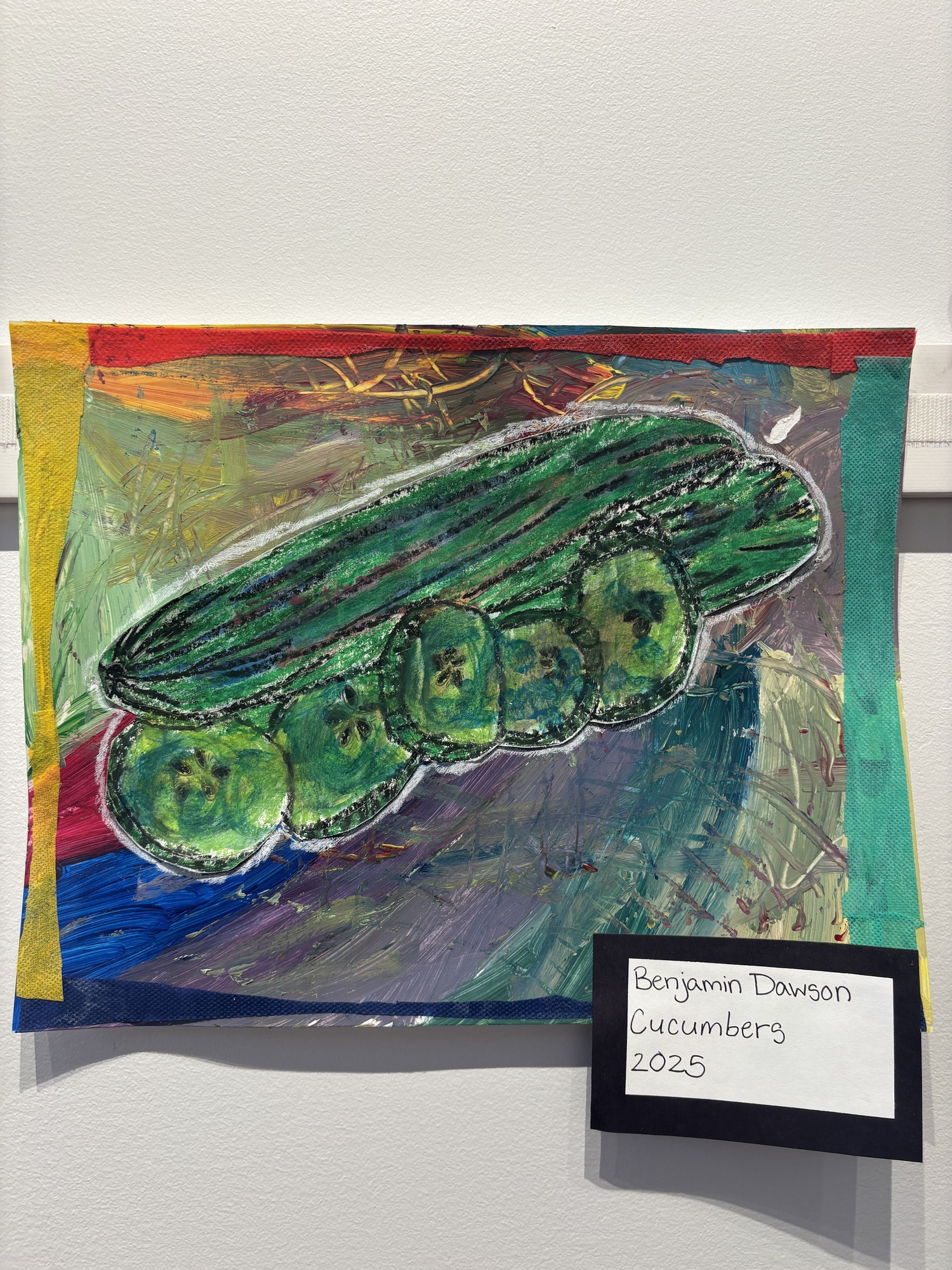 The Quogue Library hosted a reception for students, and their families, for the East Quogue School's Kid Art Inspired by Vegetables & Plants exhibit, which is on display through April 3. The works were inspired by the artwork of artist Lina Puerta, whose work focuses on indigenous farming practices and the differences between man-made food and food grown from the Earth. From left, Catie Dawson, Finn Dawson, Ben Dawson (student artist), Luke Dawson, and Ben's work titled 