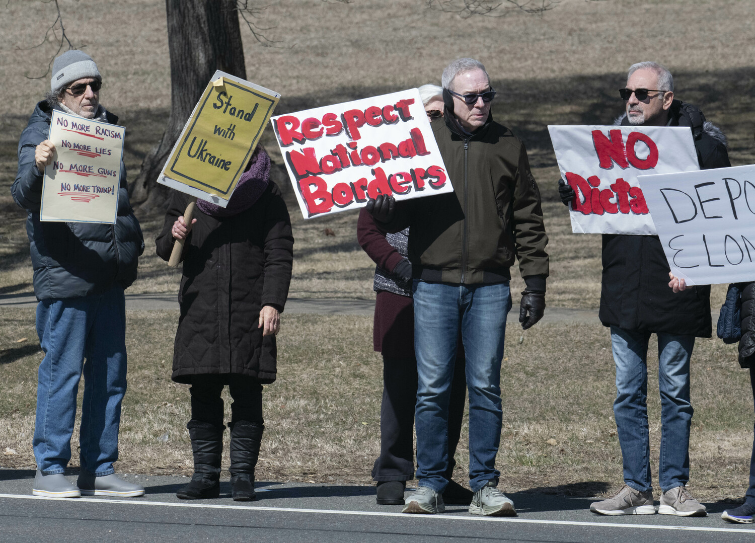 Protesters gather outside East Hampton Town Hall on March 14.  DOUG KUNTZ