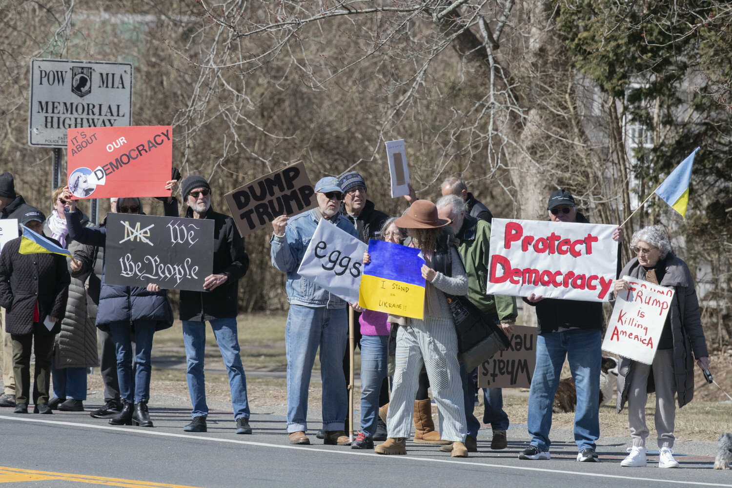 Protesters gather outside East Hampton Town Hall on March 14.  DOUG KUNTZ