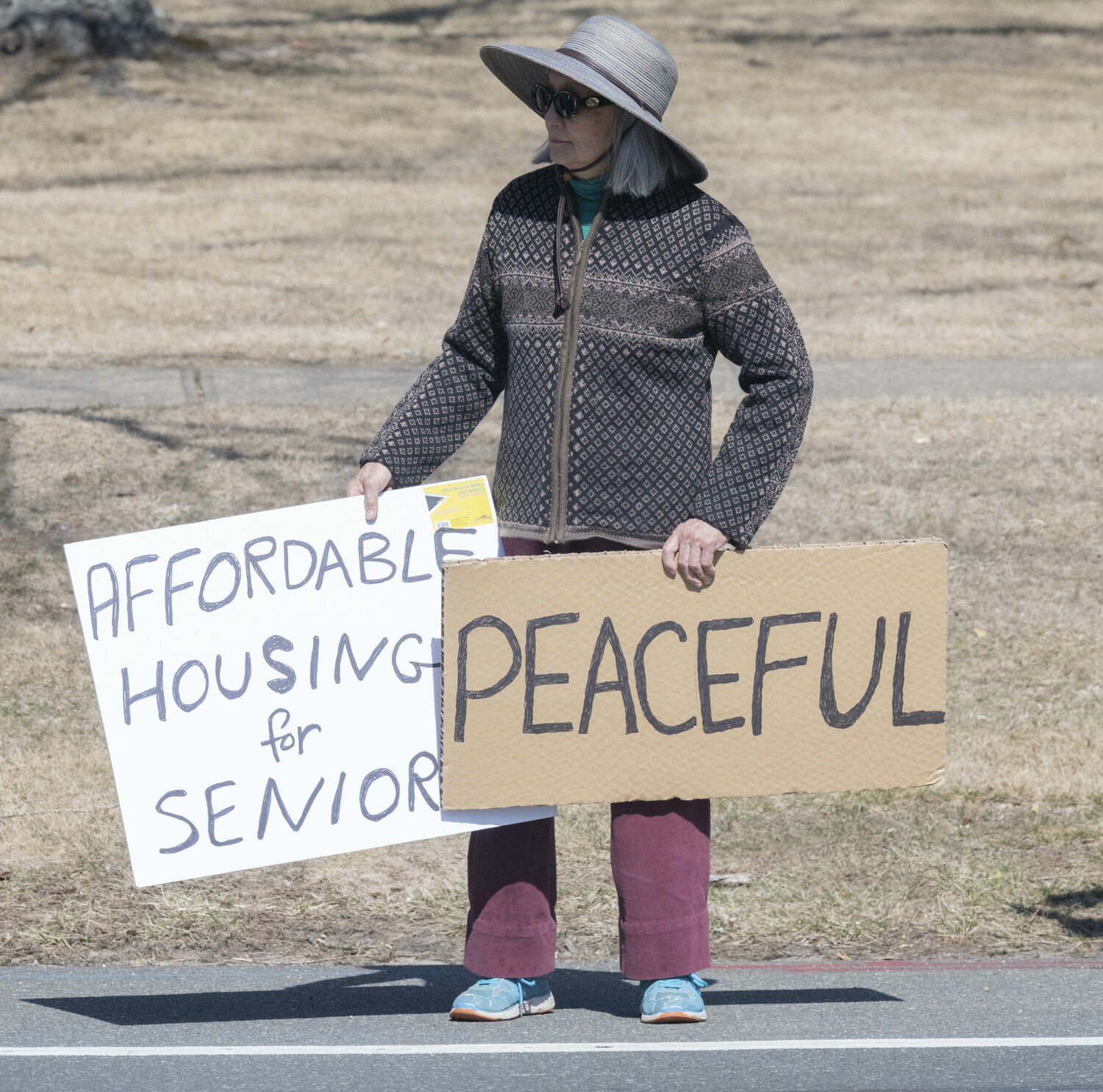 Protesters gather outside East Hampton Town Hall on March 14.  DOUG KUNTZ