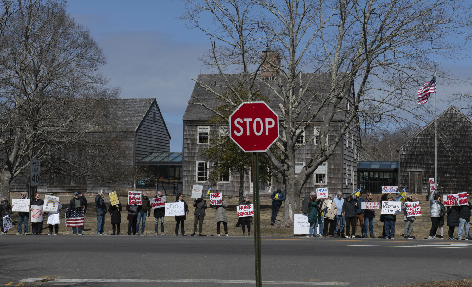 Protesters gather outside East Hampton Town Hall on March 14.  DOUG KUNTZ