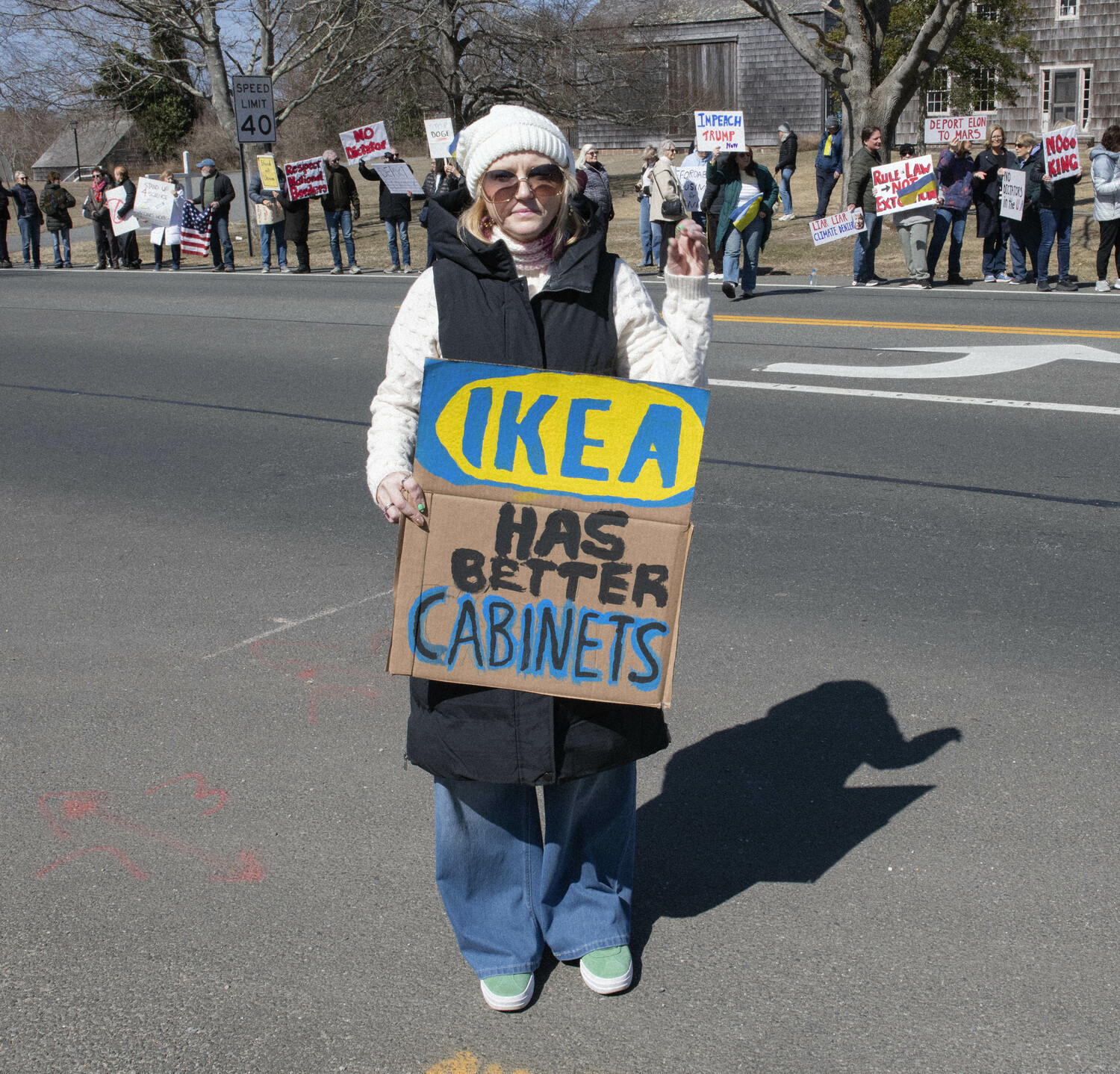 Protesters gather outside East Hampton Town Hall on March 14.  DOUG KUNTZ